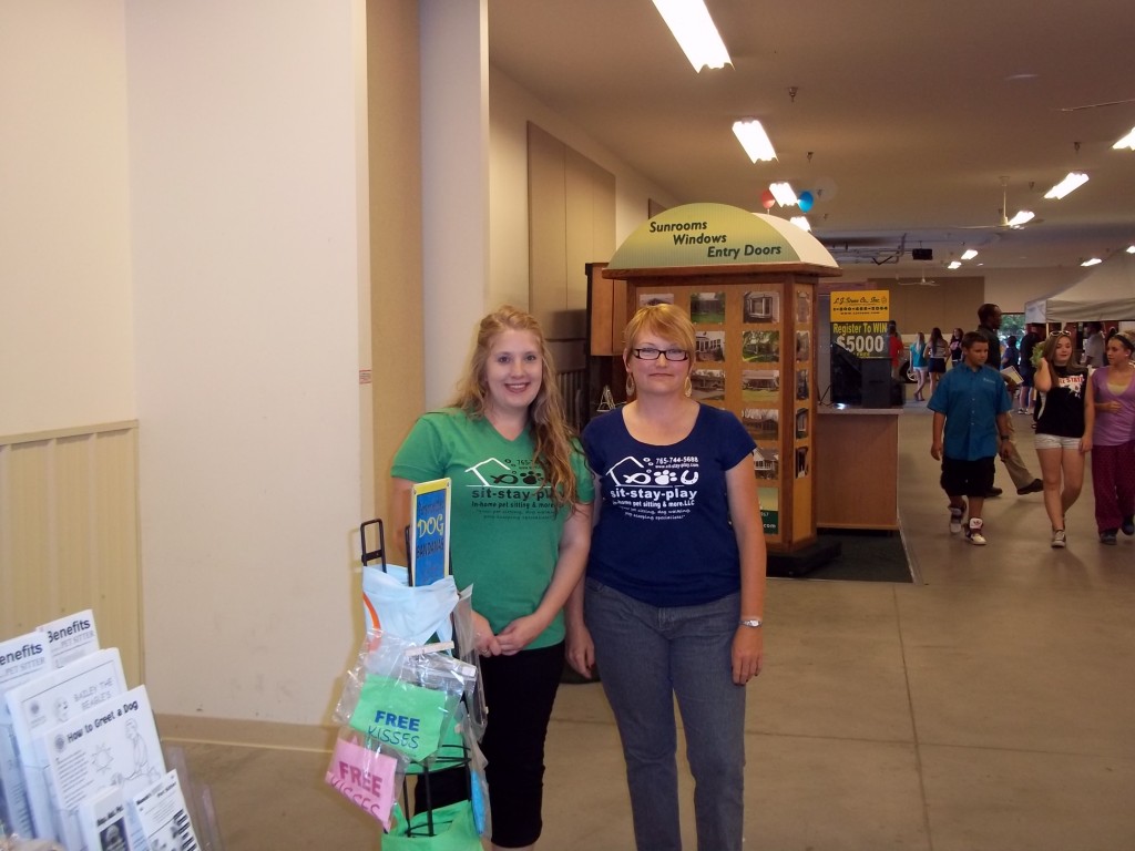 Juli and Kelley at fair pet sitting behind the scenes